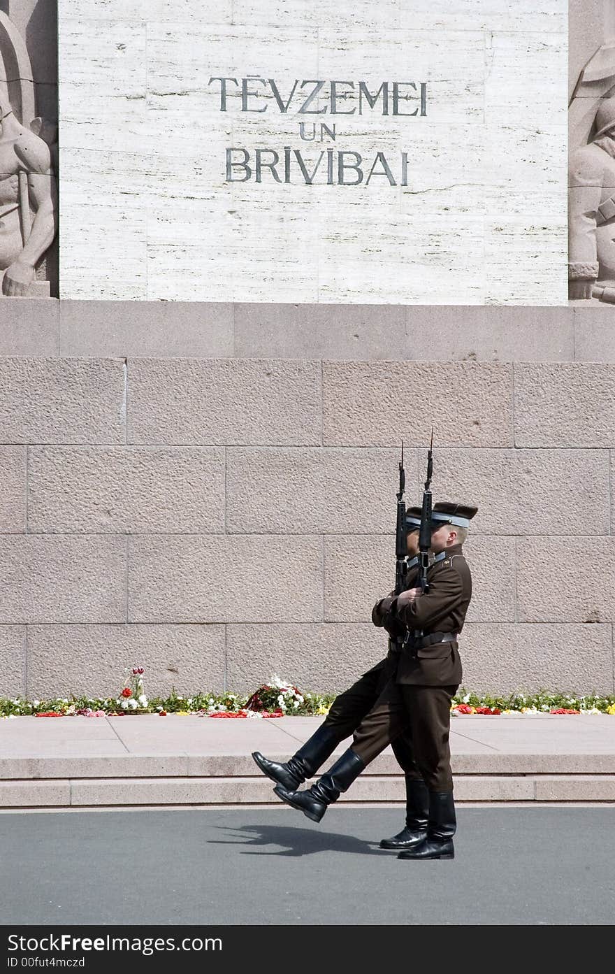 Guard of honour at a monument to Freedom in Riga