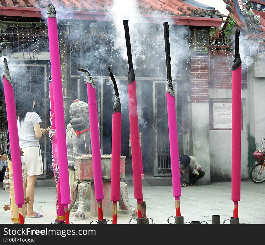 burning insence chinese temple panang malaysia