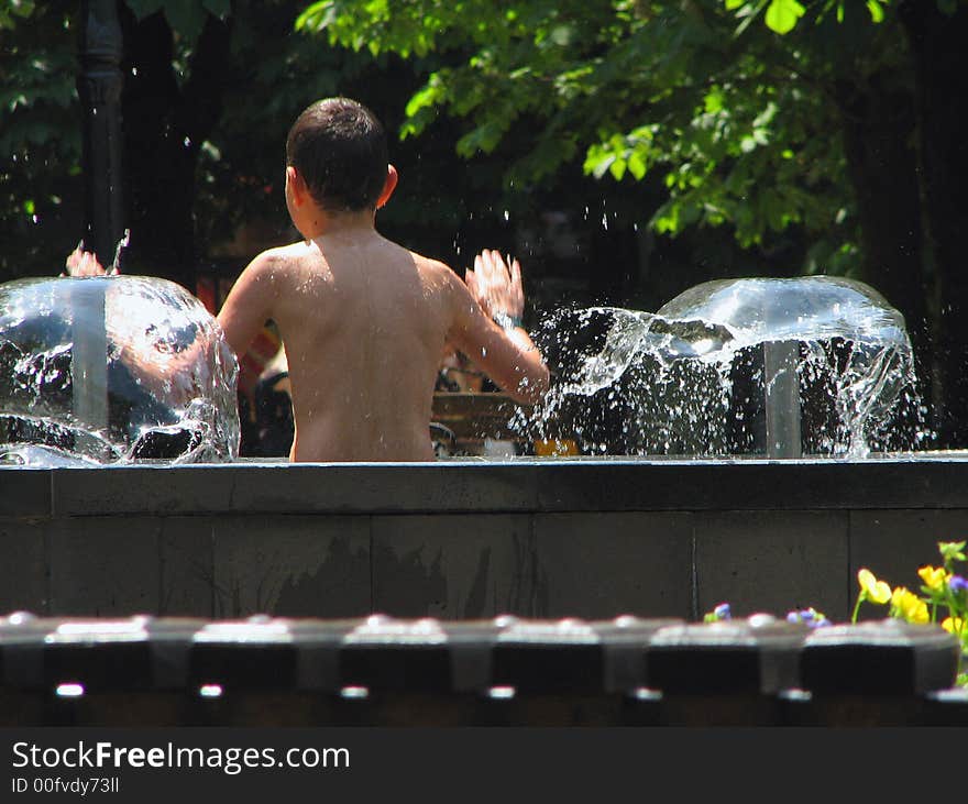 What's a pleasure to jump into the water in a summer hot midday... Adults can only dream about that looking at fountains, but kiddies really do that. What's a pleasure to jump into the water in a summer hot midday... Adults can only dream about that looking at fountains, but kiddies really do that