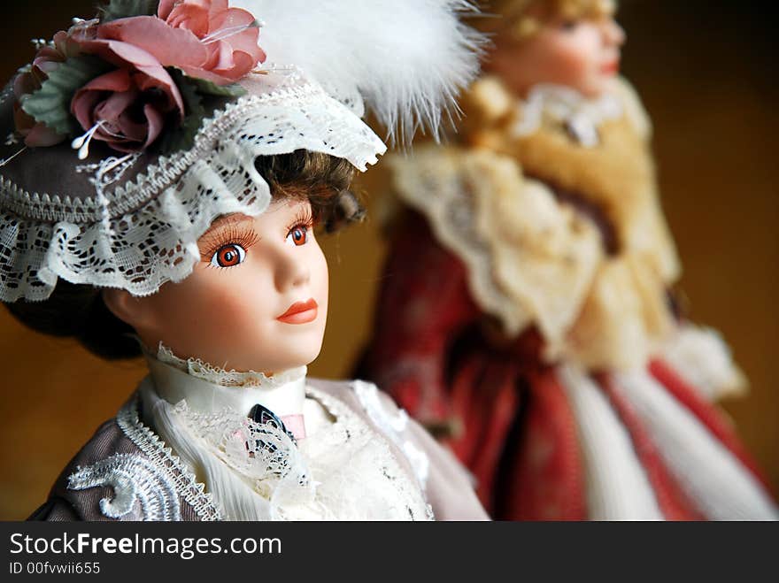 Two elegant lady dolls closeup