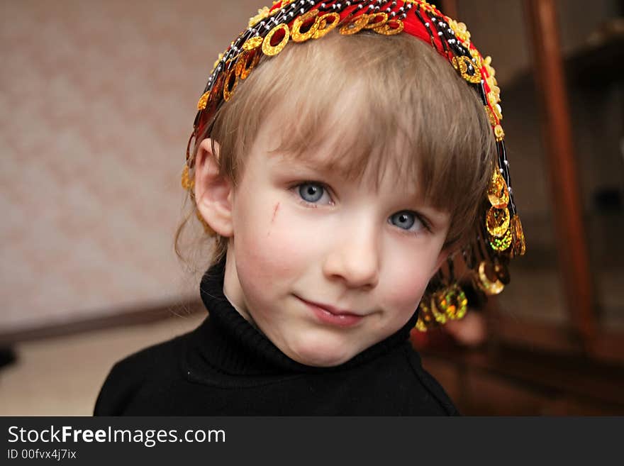 Girl in embroidered skull-cap