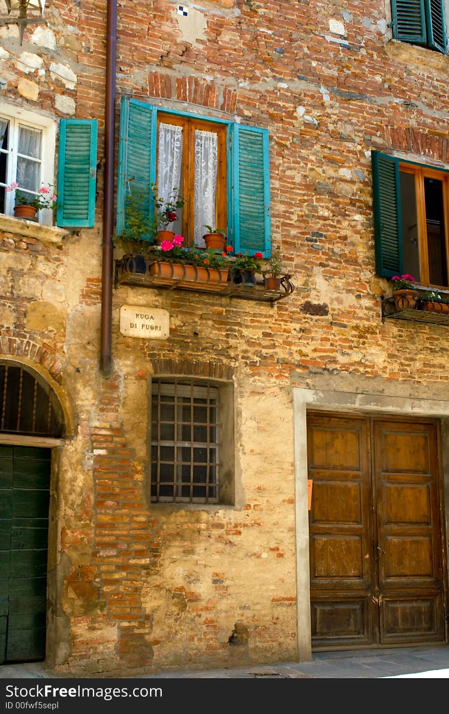 Windows with shutters, village in Tuscany region of Italy. Windows with shutters, village in Tuscany region of Italy.