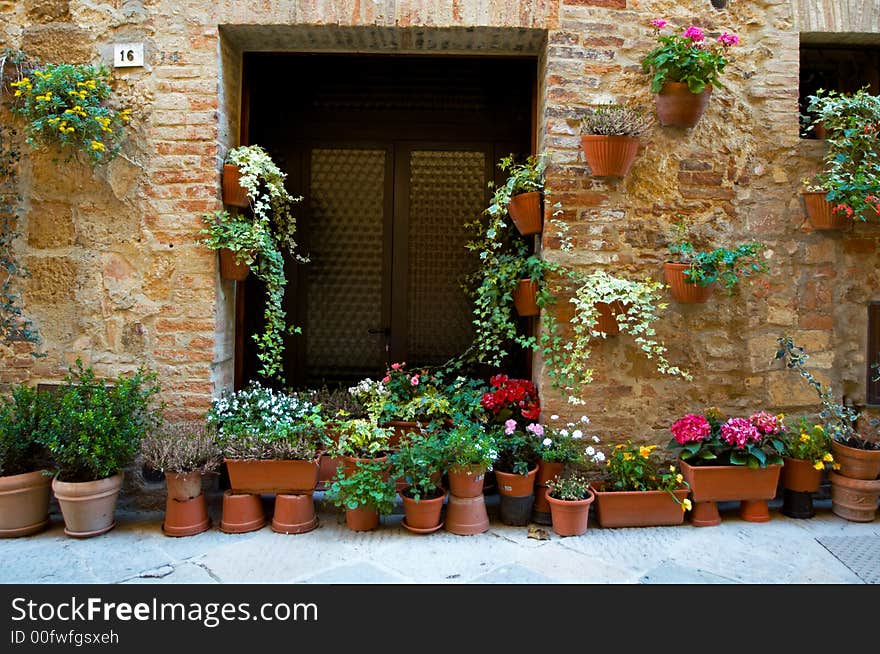 Walls and flowers in villages in Tuscany region of Italy. Walls and flowers in villages in Tuscany region of Italy.