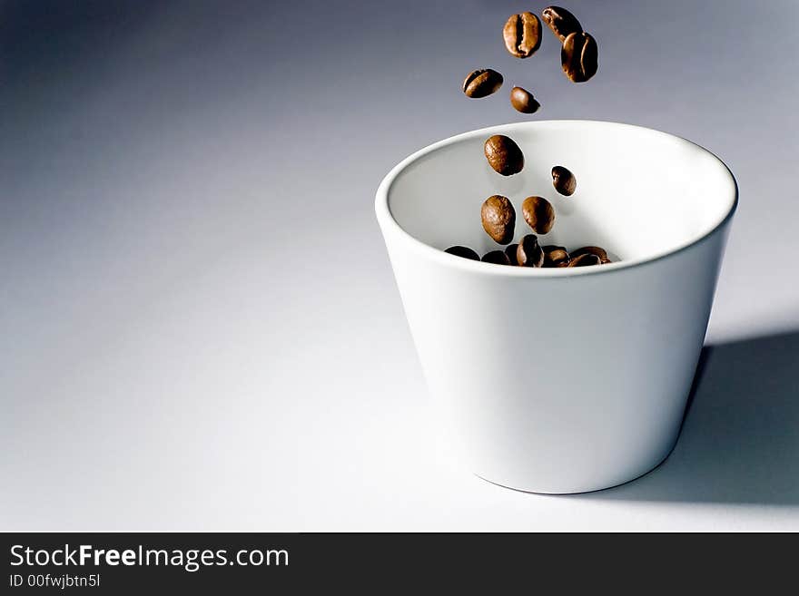 Picture of coffee beans in motion. Picture of coffee beans in motion