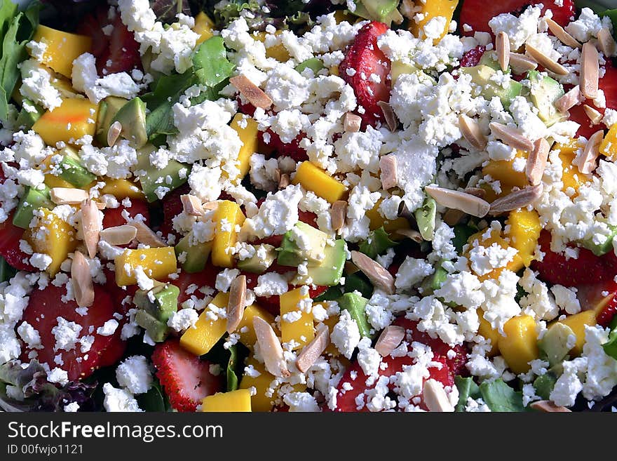 Fresh salad made with mango's,strawberries,lettuce,avocado,feta cheese and roasted nuts. Fresh salad made with mango's,strawberries,lettuce,avocado,feta cheese and roasted nuts