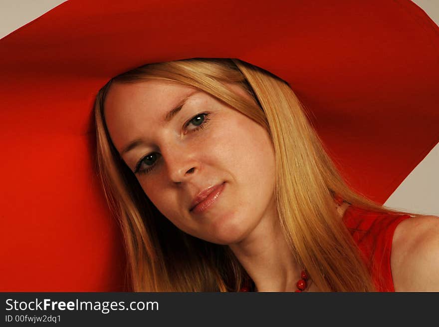 A head of beautiful blond women in red. A head of beautiful blond women in red