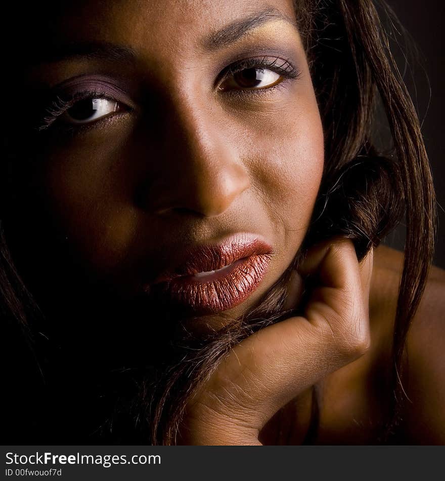 A beauty portrait taken from an african model in the studio. A beauty portrait taken from an african model in the studio