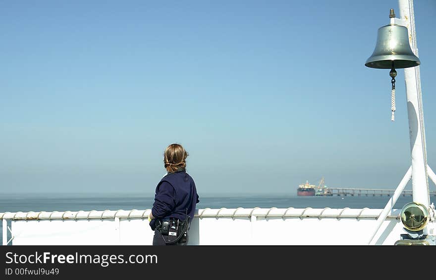 Women ferry worker waiting to leave the dock