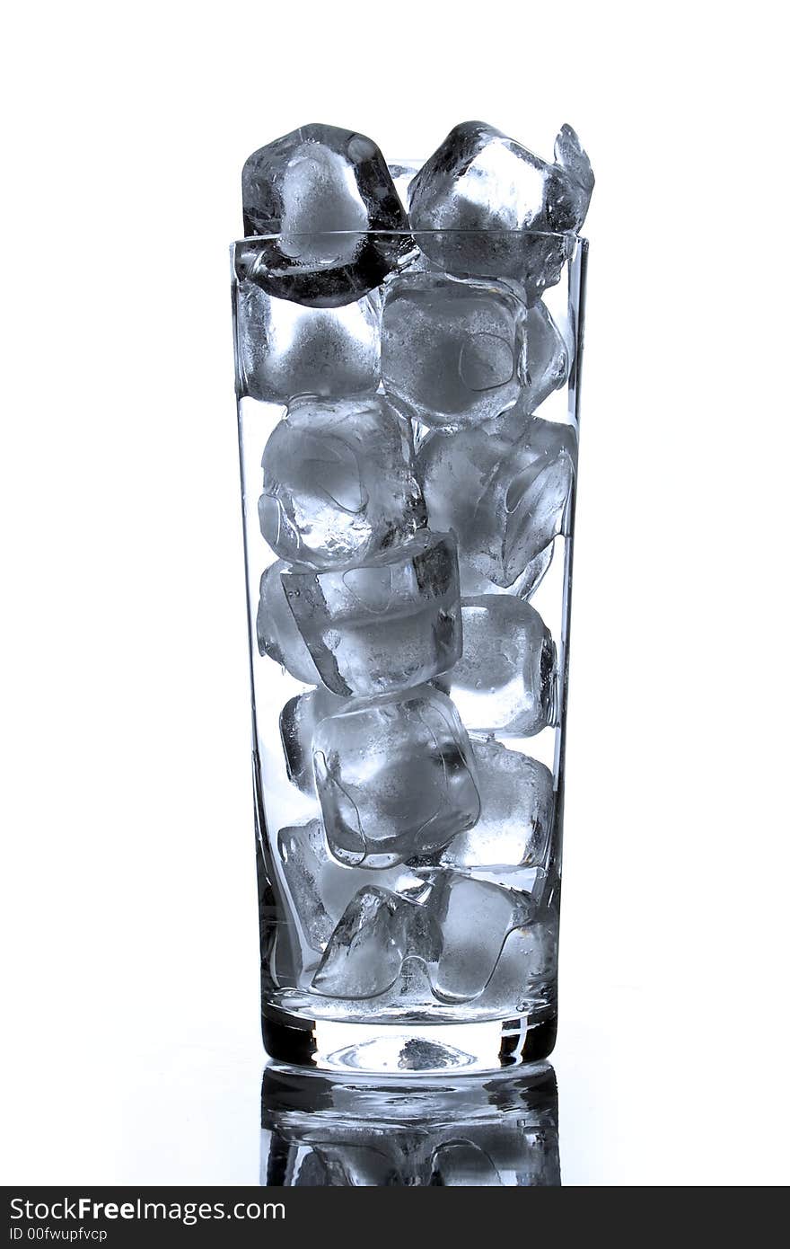 Glass bocal with ice brick on white background