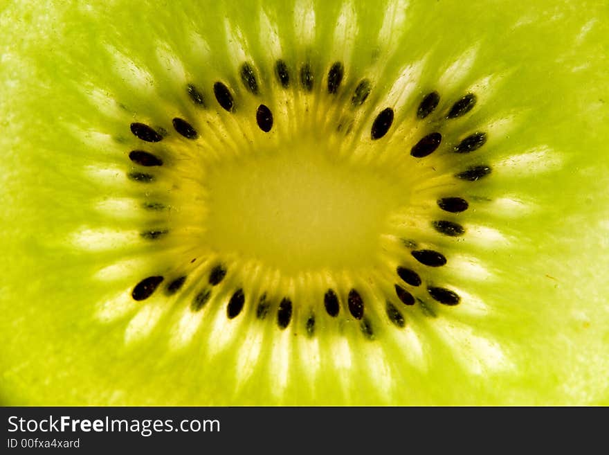 Close-up of a kiwi fruit and its seeds