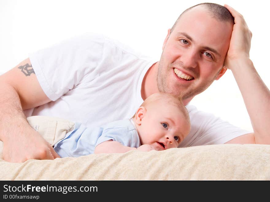 Dad playing with his cute son in blue. Dad playing with his cute son in blue