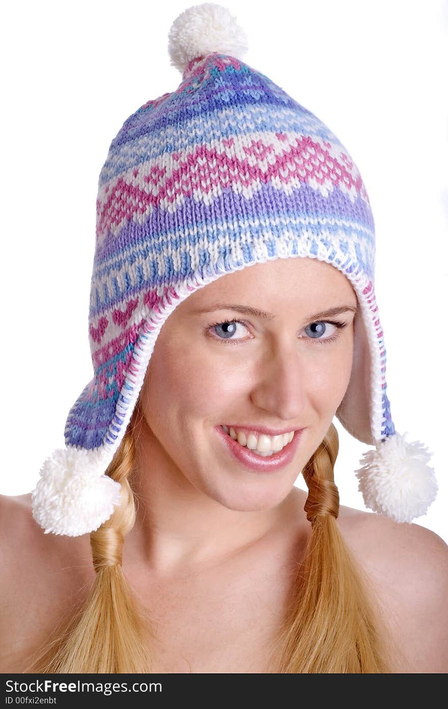 She is showing a winter hat. She is showing a winter hat