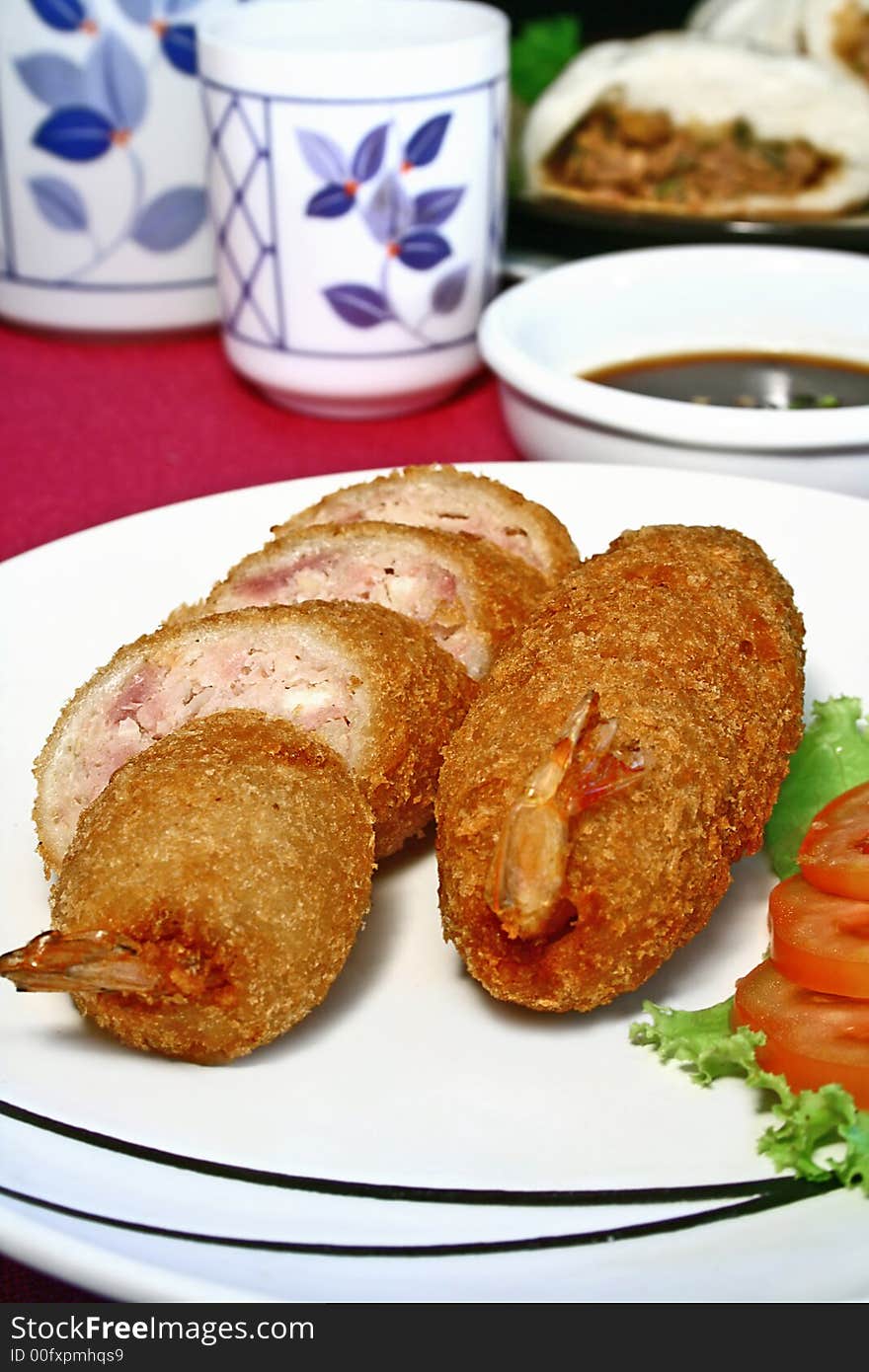 Plate of fried pork and shrimp meat roll