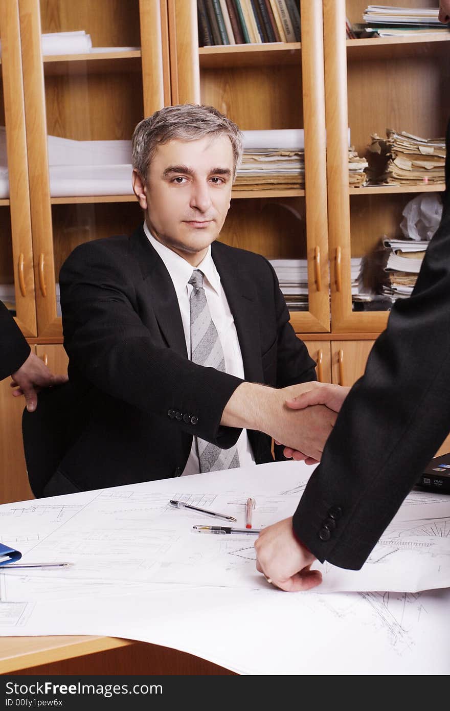 Group of business people working together in the office. Group of business people working together in the office.