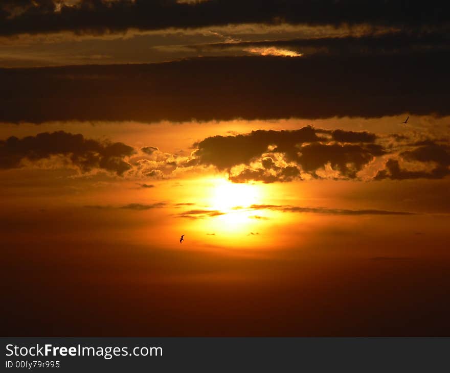 Sundown among the enigmatic clouds. Sundown among the enigmatic clouds