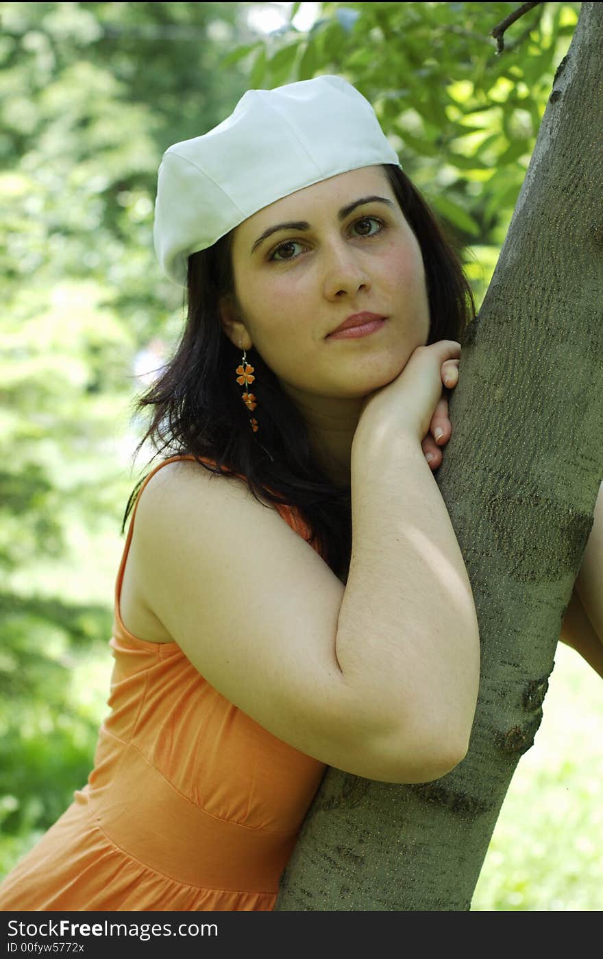 Outdoors portrait of the girl in a hat