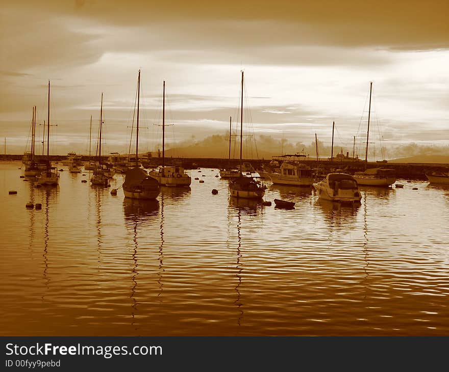 This is a shot of yachts at sunset at Manila bay. This is a shot of yachts at sunset at Manila bay.