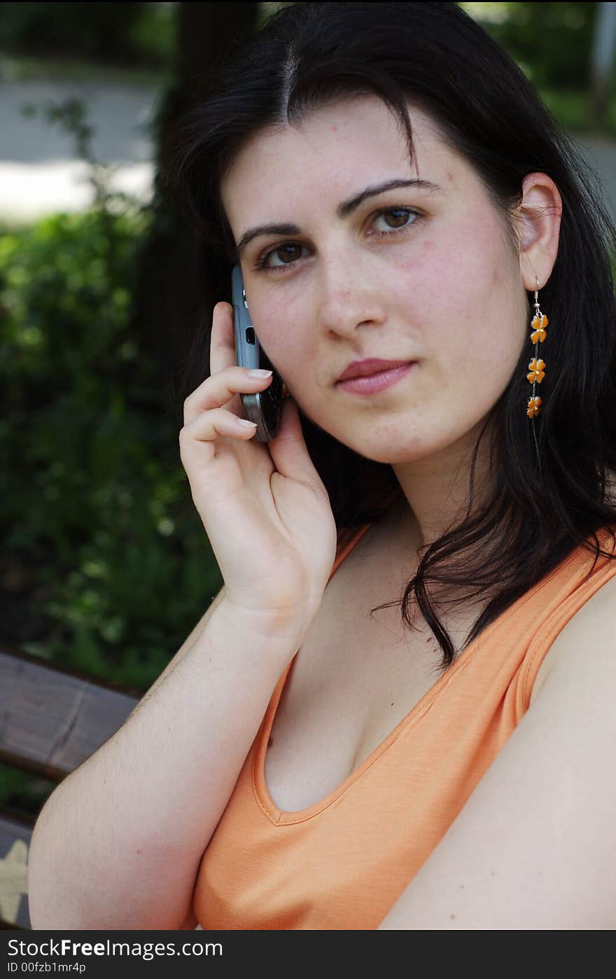 Close-up of a beautiful women talking on her cellphone. Close-up of a beautiful women talking on her cellphone