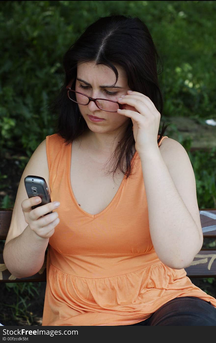 Close-up of a beautiful women talking on her cellphone. Close-up of a beautiful women talking on her cellphone