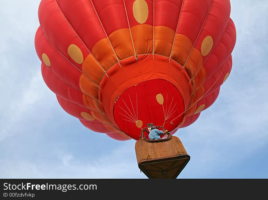 Looking up as strawberry hot air balloon ascends. Looking up as strawberry hot air balloon ascends