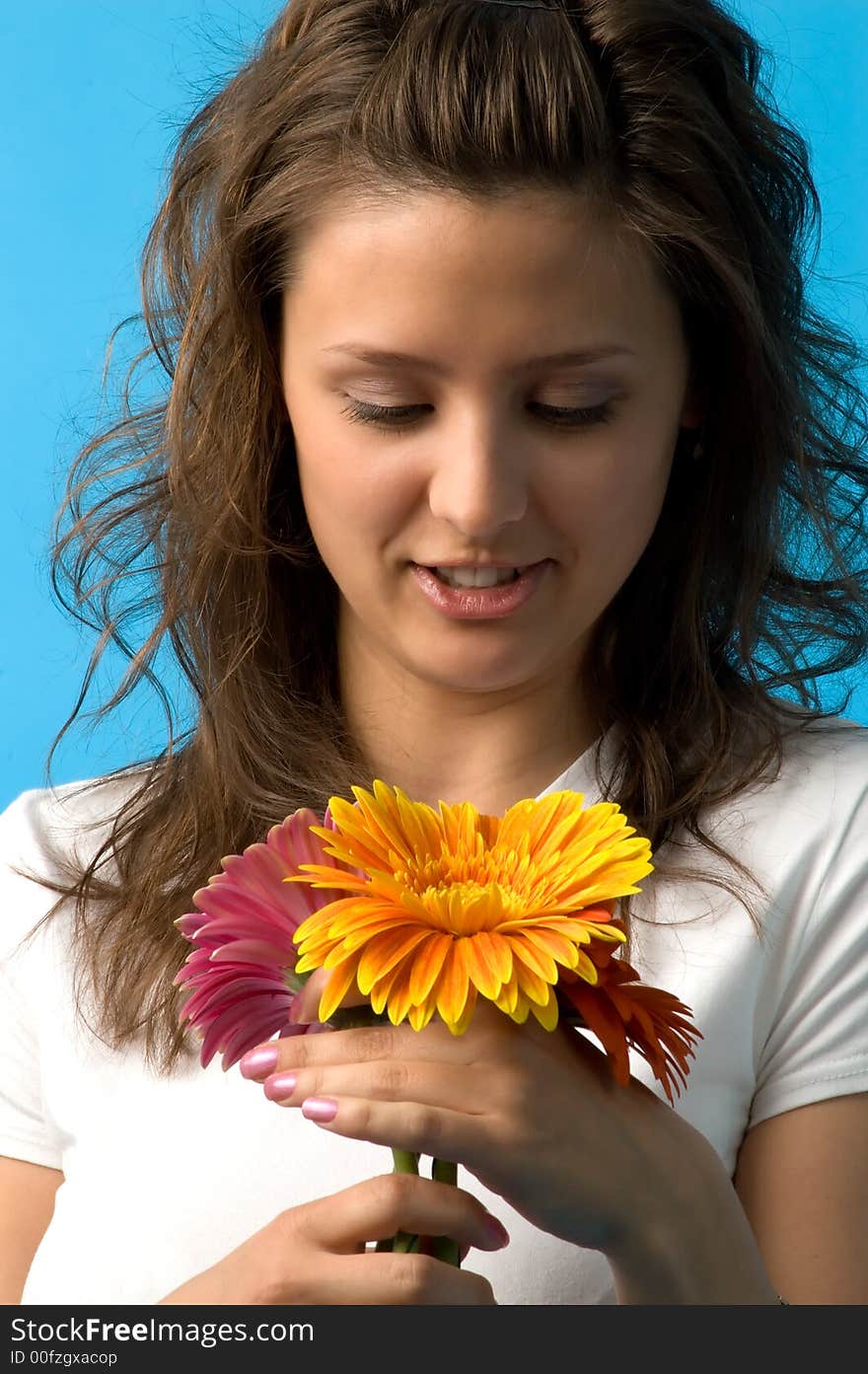 The girl with brown eyes and a bouquet of flowers. The girl with brown eyes and a bouquet of flowers