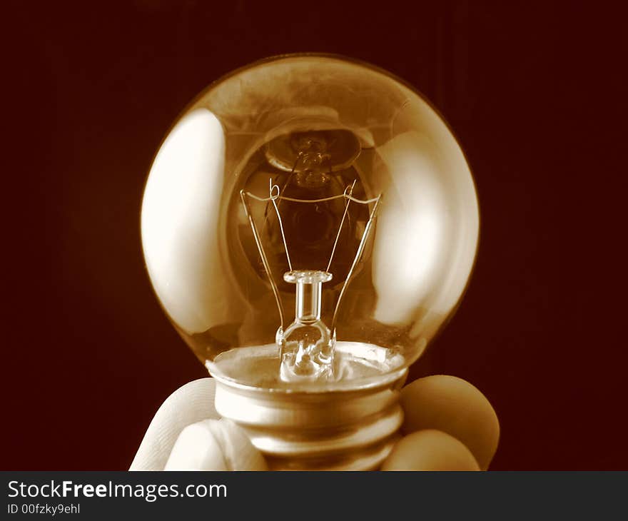 This is a close-up of the classic transparent light bulb. This is a close-up of the classic transparent light bulb.