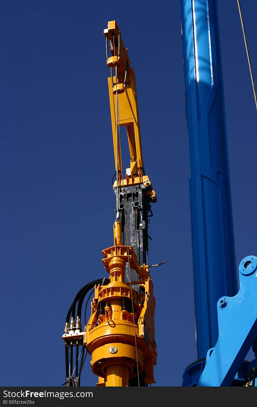 Sophisticated construction equipment on a blue sky. Sophisticated construction equipment on a blue sky