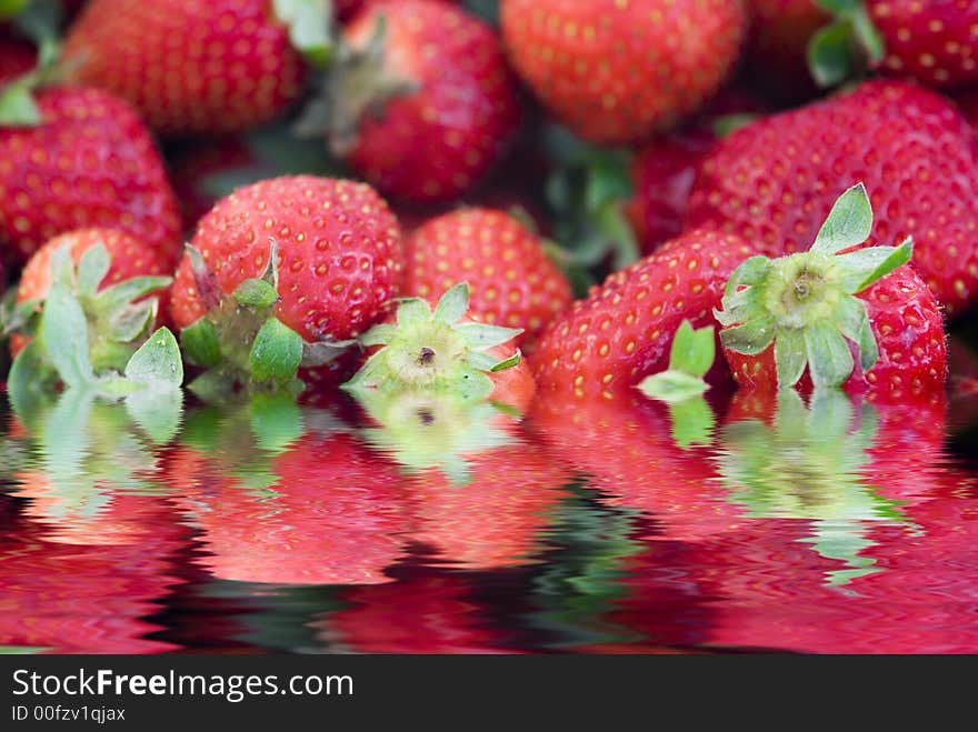 Strawberrys surrounded by water, water reflection. Strawberrys surrounded by water, water reflection