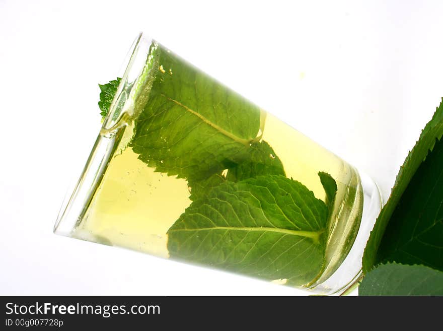 Cold tea with mint, ice, lemon. Cold tea with mint, ice, lemon