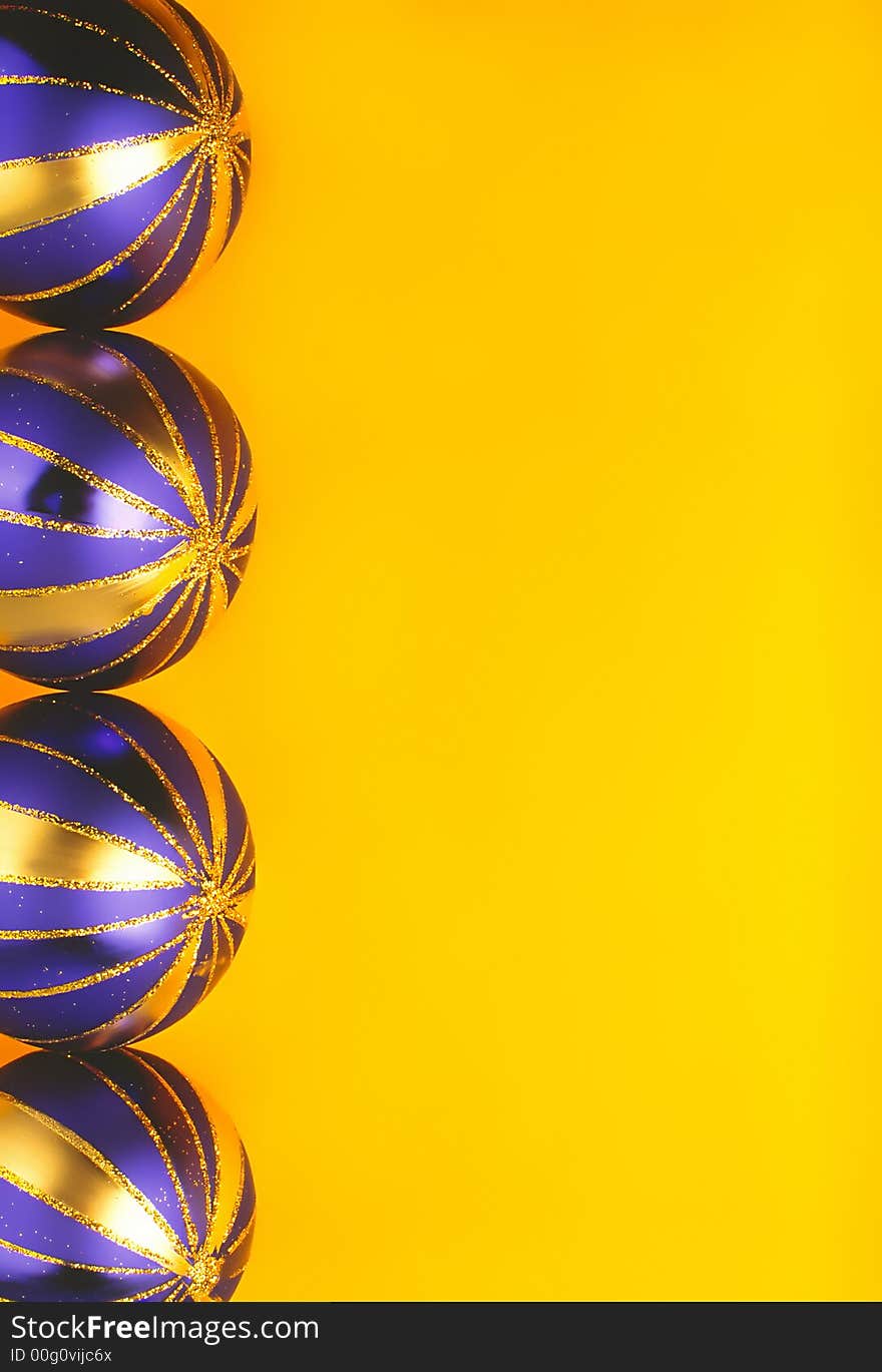 Dark blue color New Year's balls on yellow background lay in number