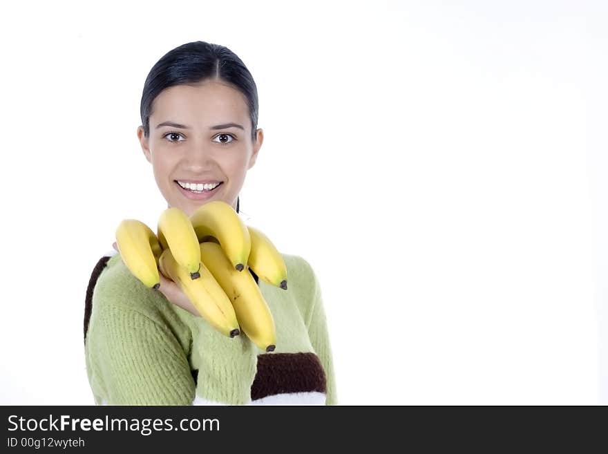 Smiling girl holding bananas in her hands. Smiling girl holding bananas in her hands