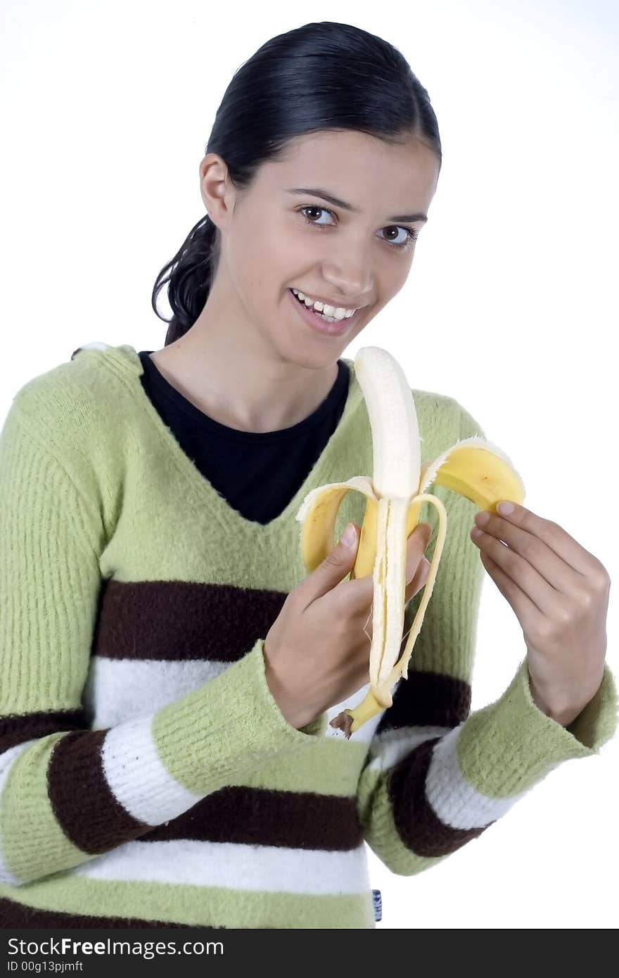 Smiling girl holding bananas in her hands. Smiling girl holding bananas in her hands