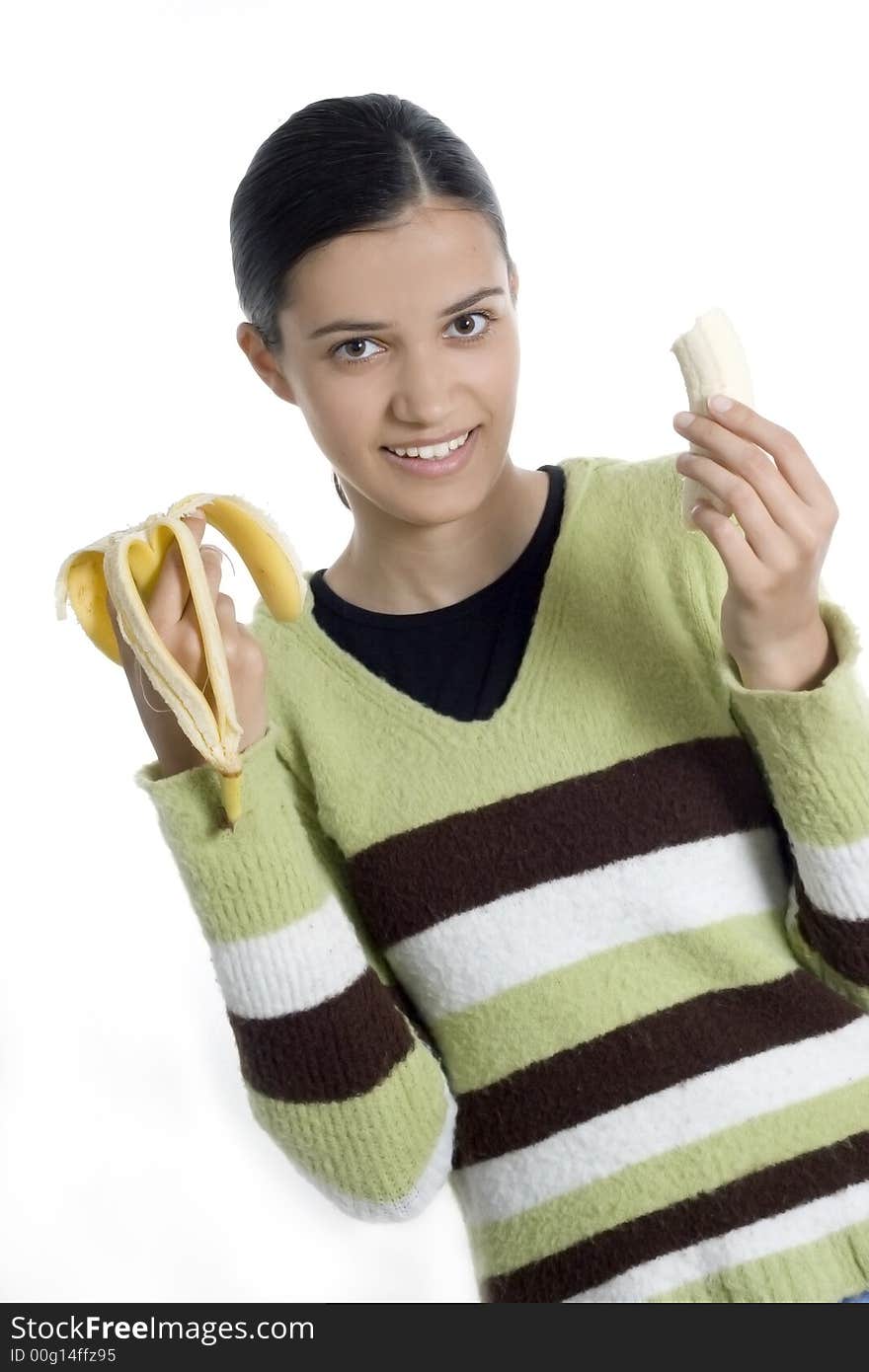 Smiling girl holding bananas in her hands. Smiling girl holding bananas in her hands