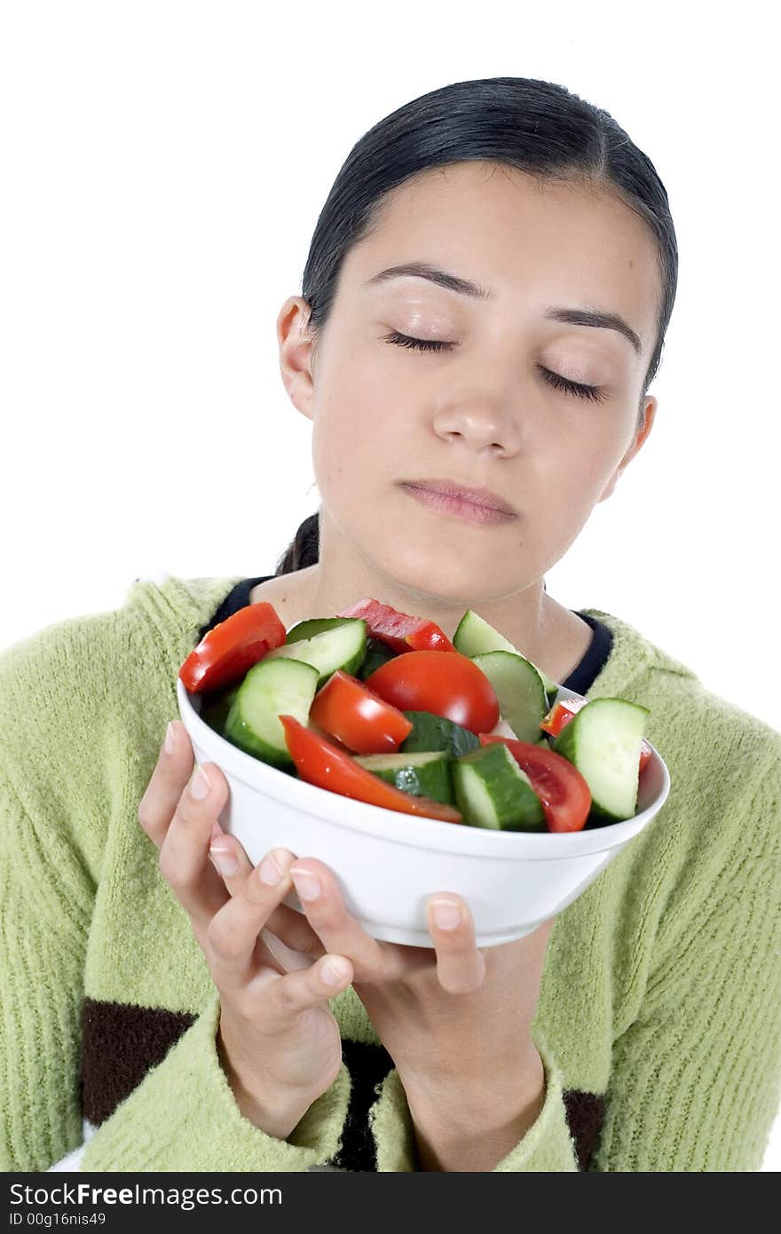 Isolated girl holding plate with salad. Isolated girl holding plate with salad