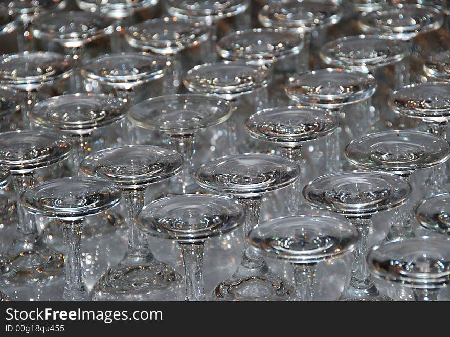 Upturned drinking glasses creating an abstract pattern. Upturned drinking glasses creating an abstract pattern