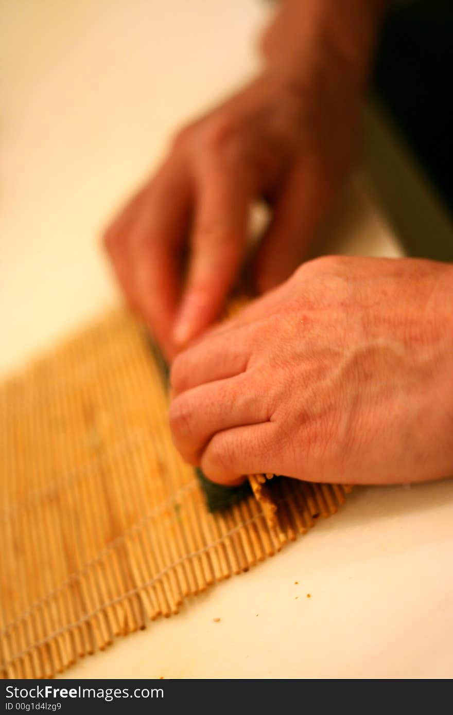 Sushi Chef Preparing California Roll. Sushi Chef Preparing California Roll