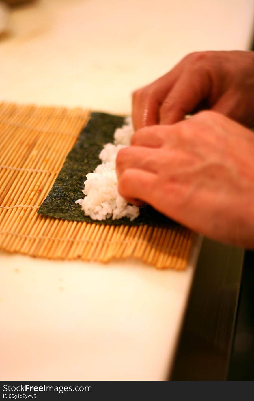 Sushi Chef Preparing California Roll. Sushi Chef Preparing California Roll