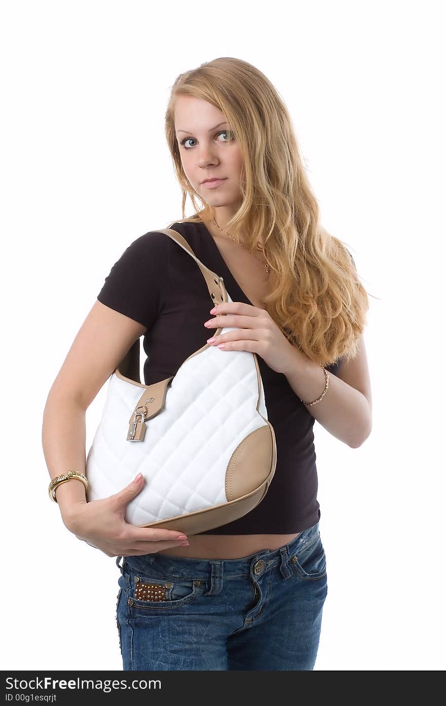 The girl-blonde potters with a white bag. The girl-blonde potters with a white bag