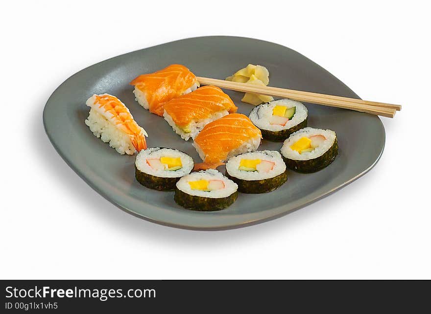 Sushi on grey plate on white background. Sushi on grey plate on white background.