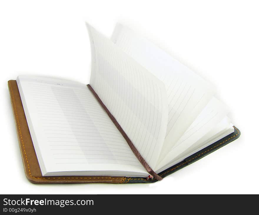 The open notebook isolated, on a white background. The open notebook isolated, on a white background.