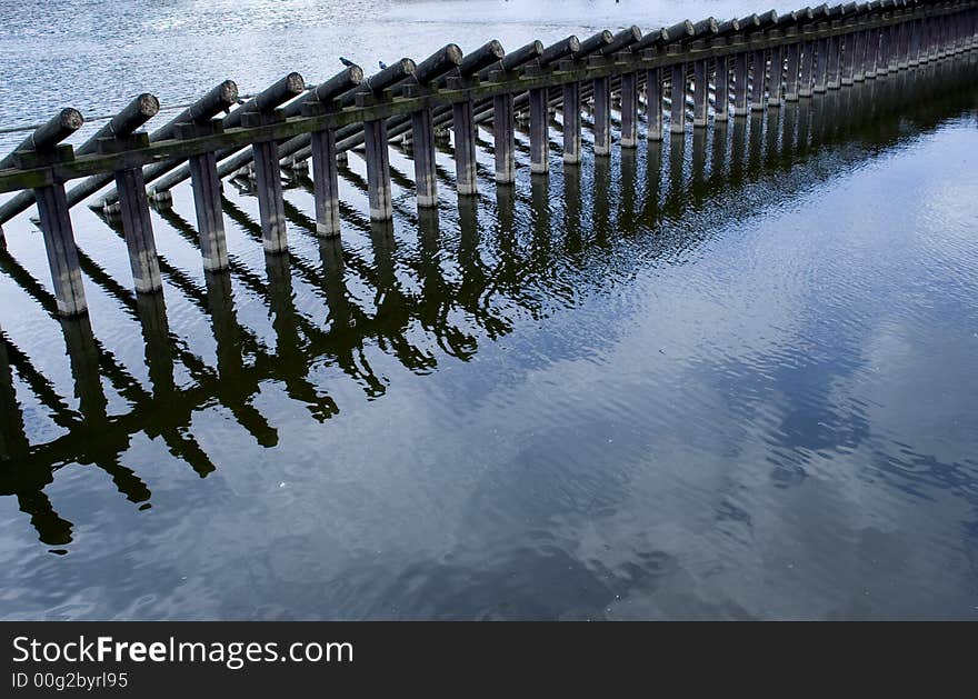 River and  breakwater at daytime. River and  breakwater at daytime