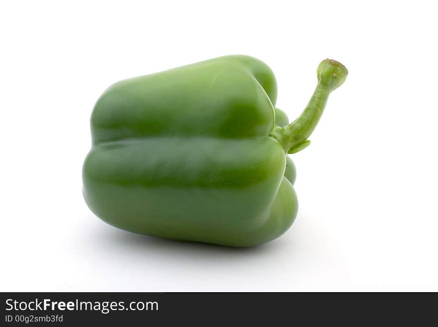 A green bell pepper, lying flat, isolated on white

<a href=http://www.dreamstime.com/search.php?srh_field=food&s_ph=y&s_il=y&s_sm=all&s_cf=1&s_st=wpo&s_catid=&s_cliid=301111&s_colid=&memorize_search=0&s_exc=&s_sp=&s_sl1=y&s_sl2=y&s_sl3=y&s_sl4=y&s_sl5=y&s_rsf=0&s_rst=7&s_clc=y&s_clm=y&s_orp=y&s_ors=y&s_orl=y&s_orw=y&x=29&y=15> See more food pictures.</a>
. A green bell pepper, lying flat, isolated on white

<a href=http://www.dreamstime.com/search.php?srh_field=food&s_ph=y&s_il=y&s_sm=all&s_cf=1&s_st=wpo&s_catid=&s_cliid=301111&s_colid=&memorize_search=0&s_exc=&s_sp=&s_sl1=y&s_sl2=y&s_sl3=y&s_sl4=y&s_sl5=y&s_rsf=0&s_rst=7&s_clc=y&s_clm=y&s_orp=y&s_ors=y&s_orl=y&s_orw=y&x=29&y=15> See more food pictures.</a>