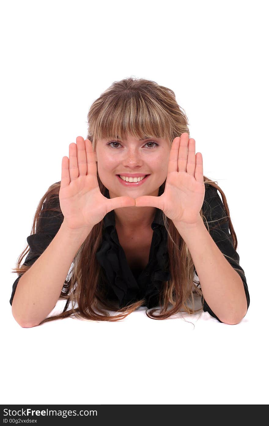 Smiling girl framing face