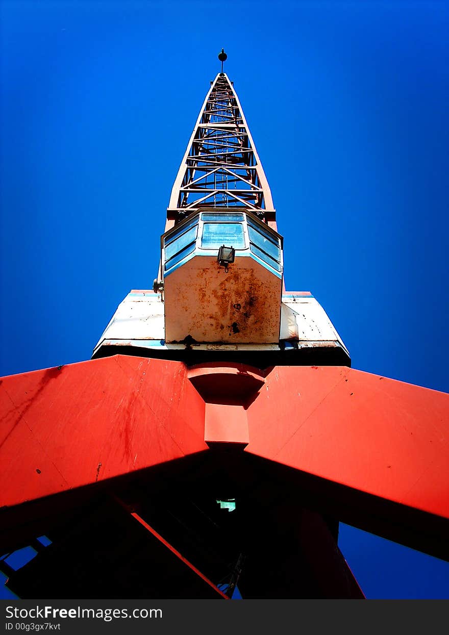 A dock crane for loading and unloading ships with cargo.