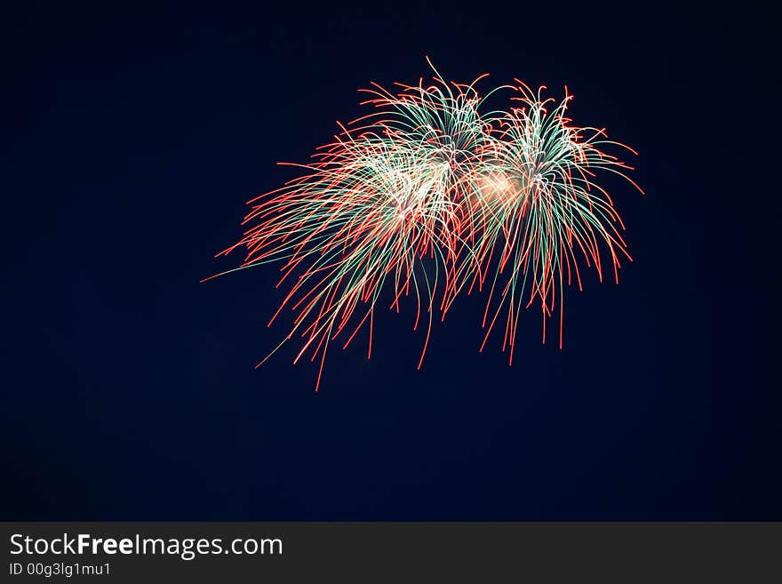 Firework on a background of the dark sky