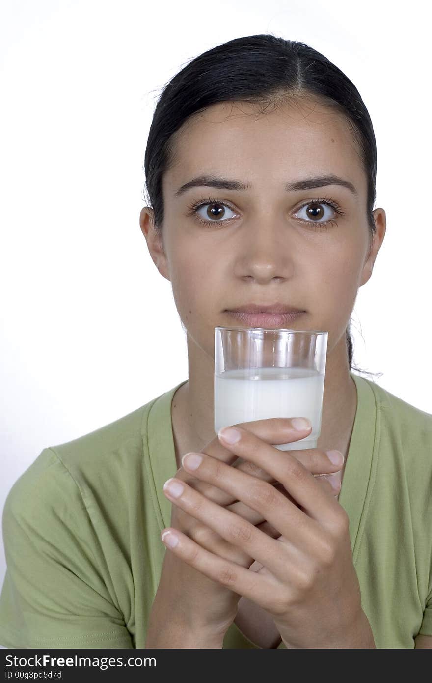 Girl holding glass with milk. Girl holding glass with milk