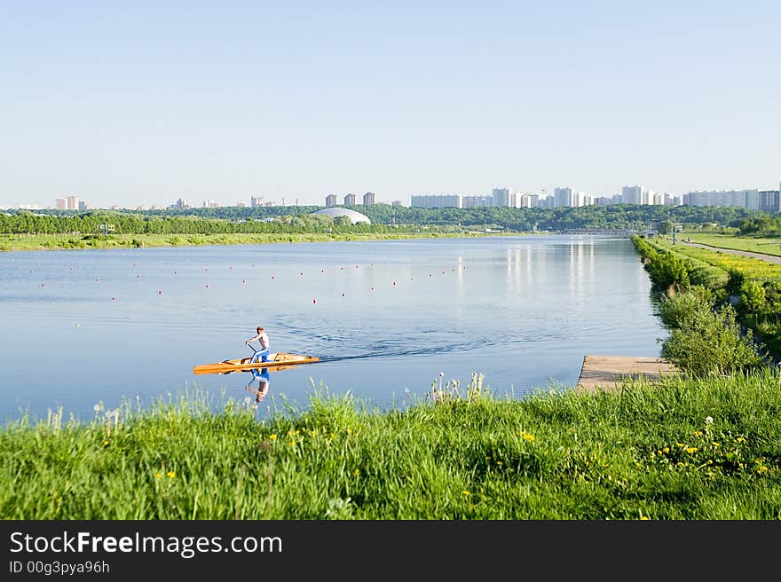 Lonely canoe on a rowing canal in Moscow. Lonely canoe on a rowing canal in Moscow