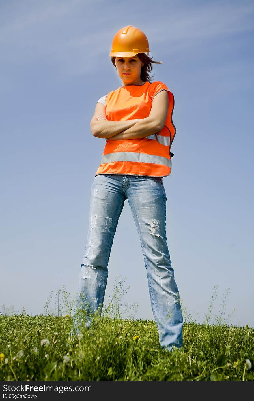 Young constructor on the grass. Young constructor on the grass