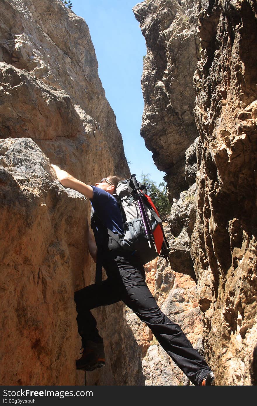 Moving up a rock in the Dolomites