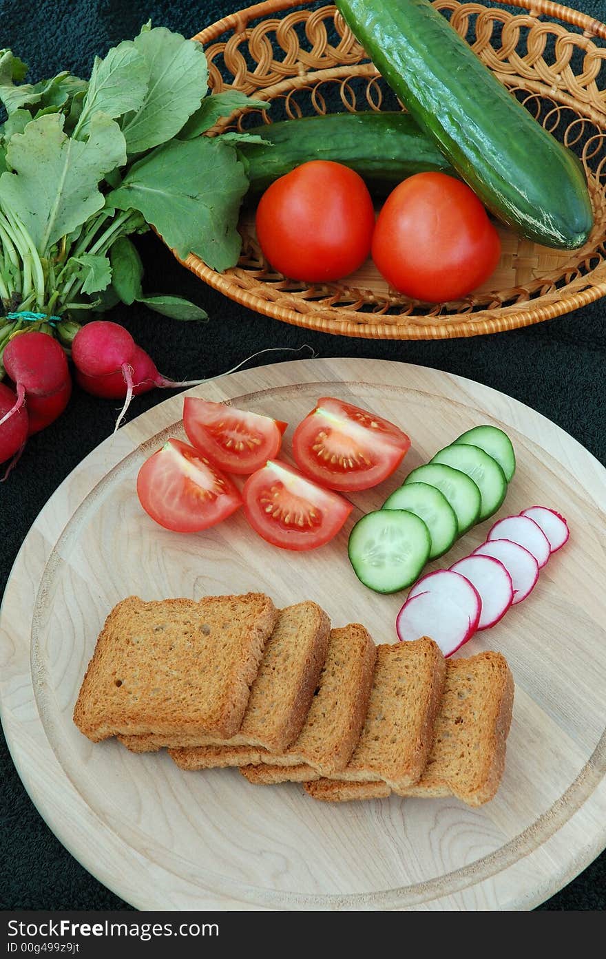 Diet cracker and vegetables on the table. Diet cracker and vegetables on the table.